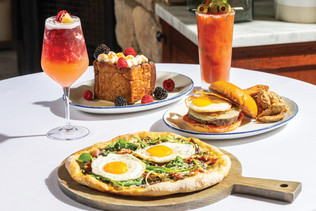 A table filled with brunch dishes and drinks