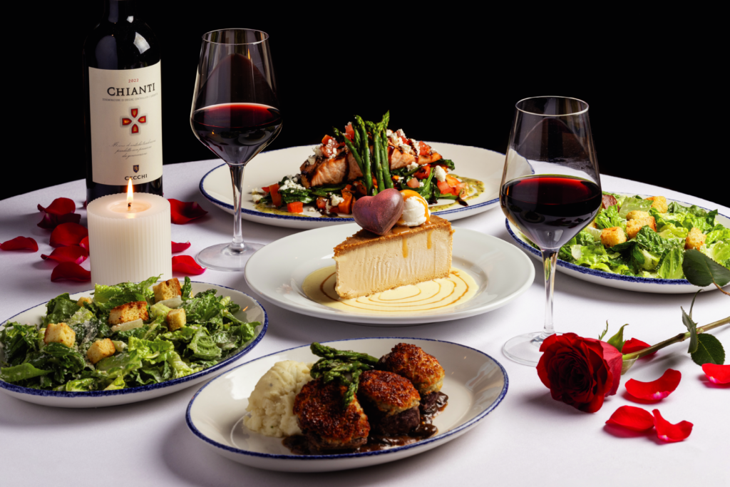 Romantic Valentine's Day dinner at Brio Italian Grille with red wine, Caesar salad, cheesecake, steak medallions, and grilled salmon.